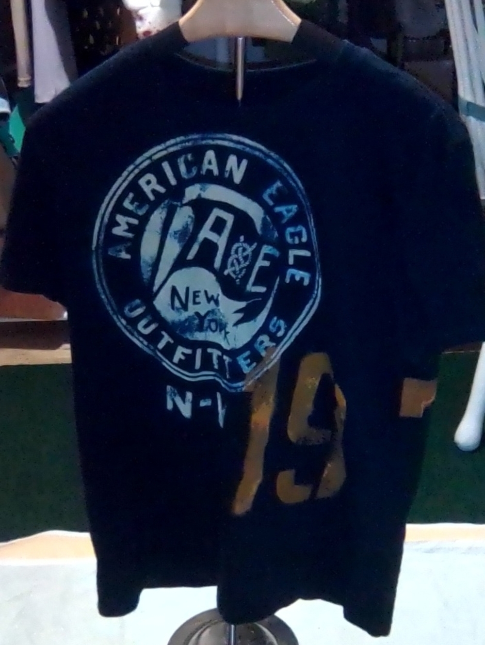American Eagle Outfitters Black Tee with Gold Graphic Numbers